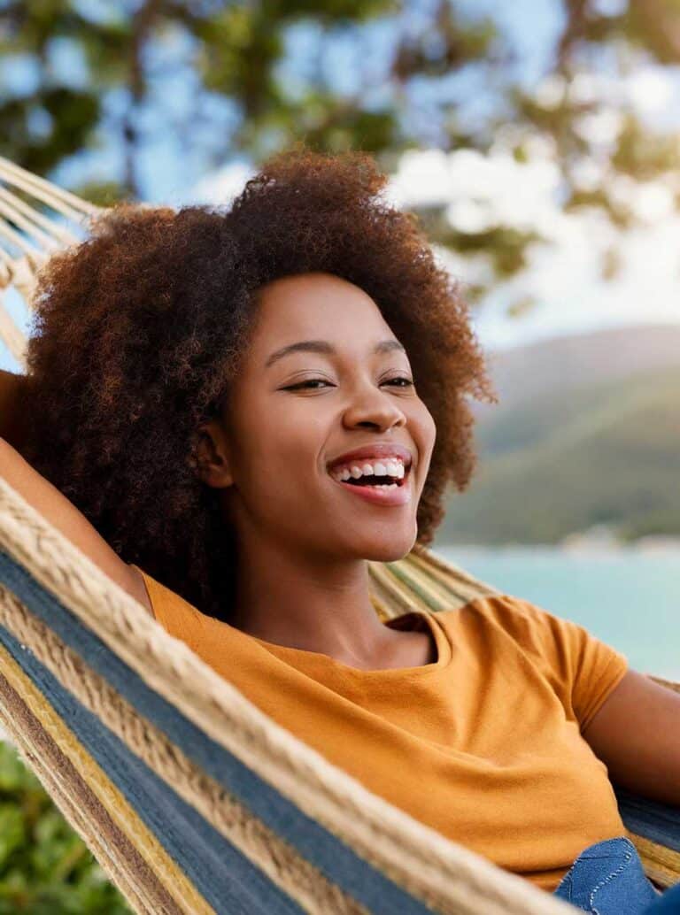 woman relaxing with our drop off laundry service wash and fold